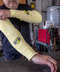 Man wearing Heavy Duty Eighteen Inch Kevlar Arm Sleeves Featuring Legit A3 Cut Resistant Armor and Heat Proof double layer weave.