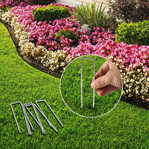 Six Inch Galvanized Landscape Staples With Gasket Caps 100 Pack U Shaped Pins for securing landscape fabric in a garden