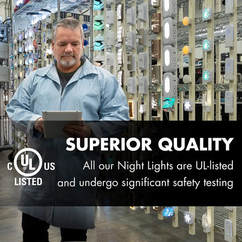 Man inspecting UL-listed night lights in safety testing facility