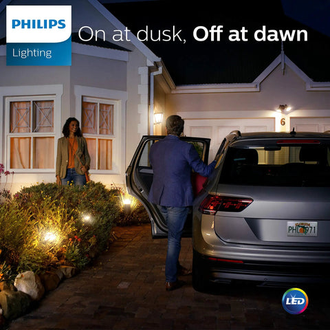 Person using Dusk To Dawn Outdoor A19 LED Light Bulb 800 Lumen Soft White 2700K 8W 60W Replacement E26 Base 3 Pack lighting at home