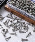 Workhorse Hex Socket Self Tapping Screws 410 Stainless Steel Flat Head Number Twelve One Inch Long Bulk Pack Two Hundred Pieces on a table.