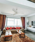 56 Inch Three Blade Indoor Ceiling Fan with Brushed Nickel Steel Blades in a modern living room.