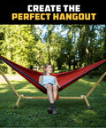 Portable Hammock Stand Hang Anywhere 106 By 42 Inches With 440 Pound Capacity in use outdoors, person relaxing on hammock.