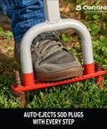Person using Yardbreather Manual Core Lawn Aerator With Heat Treated Steel Footplate And Spikes, close-up on foot and tool.