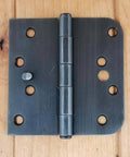 Oil Rubbed Bronze Security Door Hinges Four Inch With Five Eighths Inch Radius Security Tab Pack Of Two Includes Matching Wood Screws Anti Removal For Residential And Commercial Doors Ideal For Entry And Exterior Doors With Tamper Resistant Design installed on wood surface