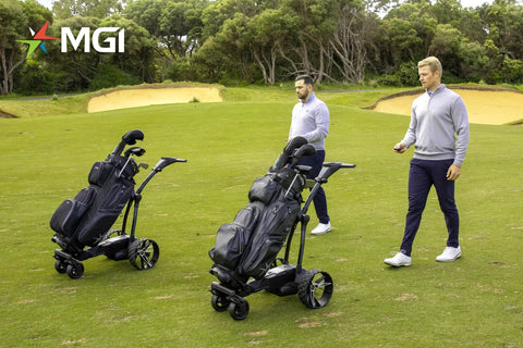 Golfers with Remote Control Electric Golf Cart With All Terrain Drive And 36 Hole Lithium Battery, black on green course.