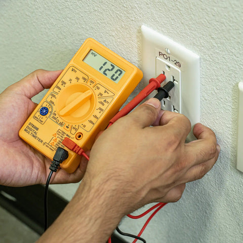 Digital Multimeter And Diode And Transistor Tester For Automotive And Home Use Must Have AC DC Volt Meter Battery Tester Analog Multimeter Kit Voltage Meter For Cars And Electronics in use testing wall socket.