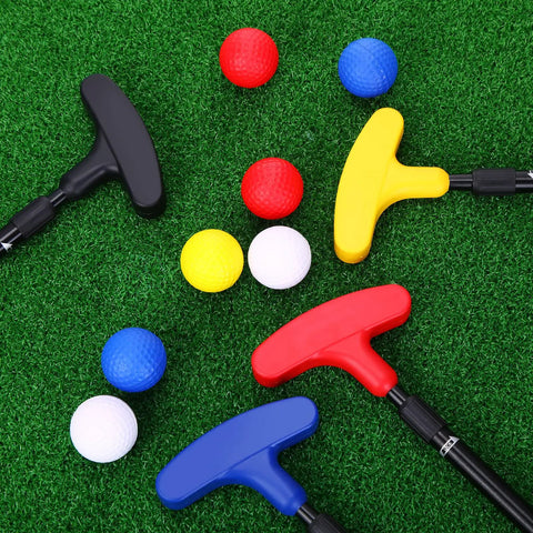 Two Way Mini Golf Putter Set Four Pack With Adjustable Length Includes Four Balls Right Or Left Handed Golf Putters For Kids Teens Grownups Multicolor Bulk Golf Training Kit For Practice And Fun showing multicolor putters and balls on grass