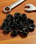 Heavy Duty M8x1.25mm Metric Serrated Hex Flange Nuts Built Tough With Rock Solid Grade 10.9 Alloy Steel And Premium Black Oxide Finish For Secure Grip Shop Grade Auto Fastening 25 Pack placed on wooden surface.