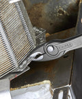 8 Inch Comfort Grip Pliers With Front And Side Gripping For Stripped Screws And Round, Square, And Hex Materials in use on metal surface