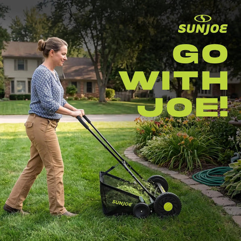 Manual Push Reel Lawn Mower With 20-Inch Cutting Width, 9-Position Height Adjustment, 8.5-Gallon Grass Catcher, Lightweight Eco Friendly Yard Care Machine For Quiet, Gas-Free Mowing And Easy Lawn Maintenance used on a suburban lawn