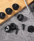 Heavy Duty Rubber Feet Isolation Pads With Stainless Steel Screws on a table, ideal for subwoofers and amps.