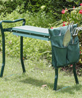 Foldable Garden Kneeler Seat With Free Tool Pouch, Sturdy Steel Bench With Wide Soft EVA Foam Cushion, 2 In 1 Kneeler And Stool For Pain Free Kneeling, Knee Saver Upgrade For Easy Gardening shown with tools in pouch, installed in garden.