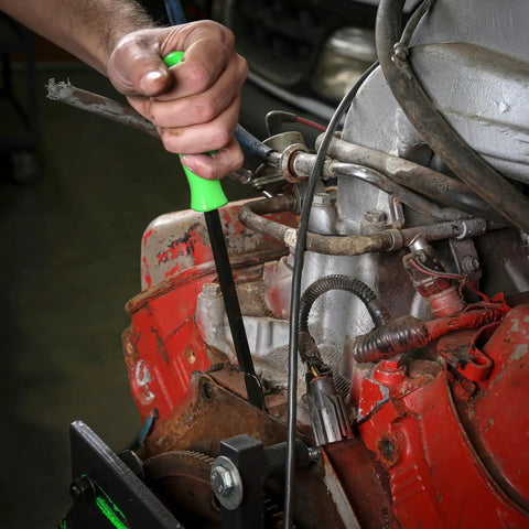 Heavy Duty Automotive Gasket Scraper With Heat Treated Steel Blade Ten And A Half Inch Extended Reach And Sure Grip Handle in use