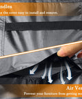 Close-up of gray Beefy Heavy Duty Patio Furniture Cover showing handle and air vents, 110x84x28 inches, anti-UV, waterproof.