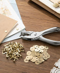 All In One Paper Fastener Kit With Hole Punch Tool And Golden Brads For Crafts, Scrapbooking, And Card Making, 100 Pcs Metal Fasteners, Smooth Paper Piercing, Easy Setup chrome hole punch with gold brads on scrapbook paper