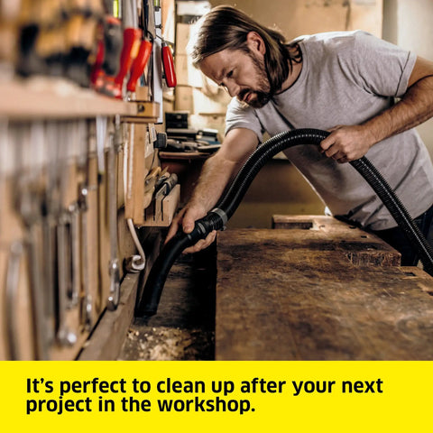 Man using 5.3 Gallon Wet And Dry Shop Vacuum With Attachments For Home Garage And Workshop Pro Grade Suction in workshop
