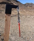 AR500 Steel Target 4 Inch Gong Silhouette Three Eighths Inch Thick Plasma Cut Red Color High Visibility hanging outdoors