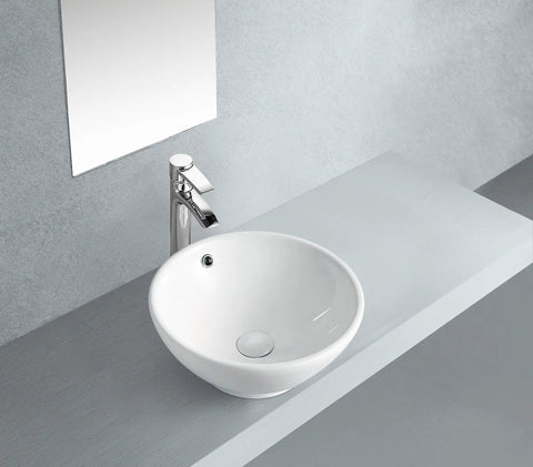 Vitreous China Bathroom Vessel Sink In White, Durable Chemical And Heat Resistant Vessel Basin, 18 11/16 In Long, 14 3/4 In Wide, 6 5/16 In High, ASME A112.19.2 Compliant, Drain Not Included, installed on a modern bathroom vanity.