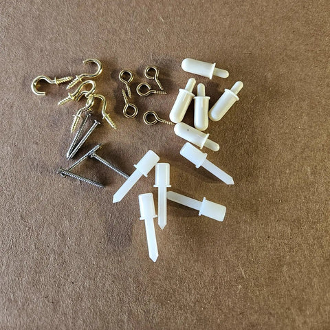 Solid Hardwood Shutter Louver Replacement Kit Five Pack Includes Sturdy Spring Loaded Pins And Brass Screws for DIY repairs.