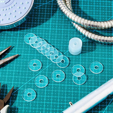 Clear Vinyl Shower Door Handle Washers 10 Pack Heavy Duty Spacers For Glass Doors And Towel Bars Built Different No Fuss Quick Install Top Shelf Quality Guaranteed on a teal mat with tools.