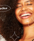 Smiling person with natural hair, enjoying summer. Sweet Watermelon Lip Balm Trio, Peaches And Cream Lip Balm, Pink Lemonade Lip Balm featured.
