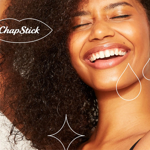 Smiling person with natural hair, enjoying summer. Sweet Watermelon Lip Balm Trio, Peaches And Cream Lip Balm, Pink Lemonade Lip Balm featured.