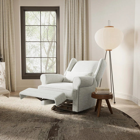 Swivel Recliner Chair With Extra Large Footrest in off-white, plush upholstered glider rocker in living room, 360 degree swivel.