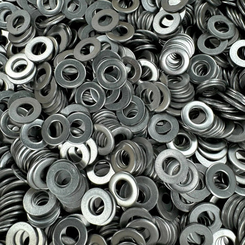 Stainless steel flat washers, close-up view; 5/16 in hole, 3/4 in outer diameter; 100 pcs