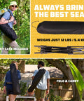 Man carrying Cozy Hammock Chair For Adults That Feels Like A Chill Rocking Lounger Portable Folding Camp Chair with carry bag