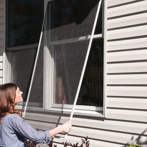 Person installing Charcoal Screen Repair Kit For 36 By 84 Inch Windows And Doors With Spline Tool And 0.140 Inch Spline DIY Mesh Fix Bundle Fiberglass