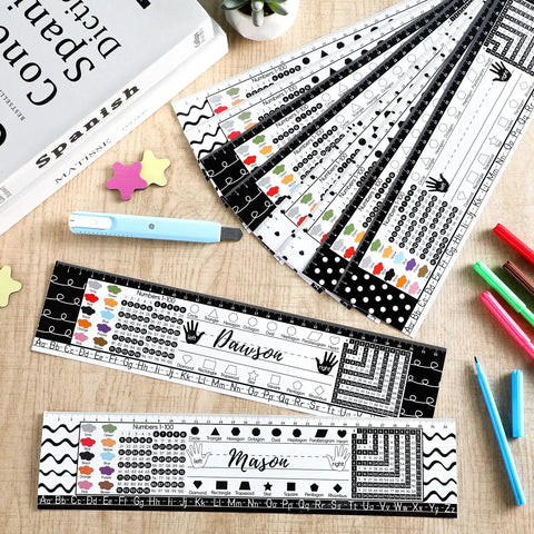 48 Pack Black White Painted Dots Classroom Name Plates Desk Name Tags For Kids Alphabet And Multiplication Desk Markers shown on table
