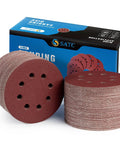 Heavy Duty 150 Pack 80 Grit Hook And Loop Sanding Discs 5 Inch 8 Hole Anti Clog Coating stacked in front of blue packaging.