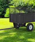 Heavy Duty 750 Lb Steel Dump Cart With 17 Cu Ft Bed Removable Mesh Sides Tow Behind Garden Wagon on lawn