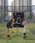 Father coaching son in 6x8Ft Batting Cage Backstop With Heavy Duty Padding And Strike Zone Vinyl Net Protector For Baseball And Softball Backyard Practice And Training Facility Shield