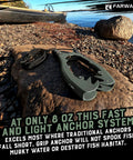 Canoe Kayak Anchor Grip With Teeth Clamps And 15ft Paracord, patented design on rocky shoreline next to water's edge.
