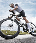 Cyclist using Assioma PRO RS-2 Dual Sensing Pedal Based SPD SL Road Power Meter With Bluetooth and ANT+ Connectivity for performance tracking