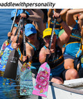 Team using Sting Plus Dragon Boat Paddle Turtle Design, Adjustable Carbon Fiber Shaft, Lightweight PMI Foam Core during race