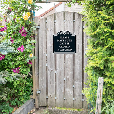 Top Shelf Outdoor Security Warning Placard Please Make Sure Gate Is Closed And Properly Latched on wooden gate with greenery.