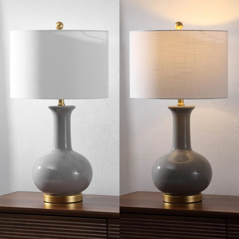27 Inch Gray And Brass Ceramic Table Lamp For Living Room And Bedroom With White Linen Drum Shade Modern Transitional Nightstand Lamp LED Bulb Included Energy Efficient And ETL Listed lit and unlit contrast.