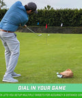 Golfer practicing with Three Pack Golf Flags For Backyard Practice And On The Go Chipping Drills, portable flagsticks visible