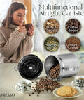16 Ounce Stainless Steel Coffee Canister With Scoop For Fresh Beans, Airtight Storage, shown with coffee and cookies.