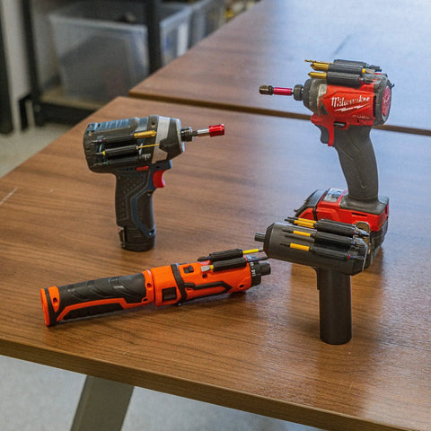 Heavy Duty Drill And Impact Driver Bit Holder With Silicone Bandolier And 3M Adhesive on multiple tools