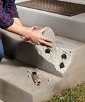 Applying Boss Level Liquid Epoxy Adhesive For Ultimate Waterproof Fixes And Leak Plugging With Six Thousand Psi Anchor Hold on concrete steps.