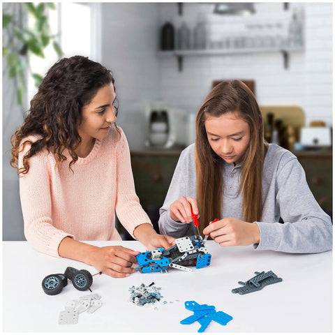 Girls assembling 10 In 1 Rally Racer Model Vehicle Building Kit For Kids, STEM Education Toy For Ages 8 And Up with real motor included.
