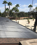 DIY Solar Pool Heater Kit With High Wind Mounting And Freeze Resistant Tech installed on rooftop, open flow design visible