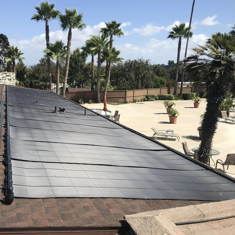 DIY Solar Pool Heater Kit With High Wind Mounting And Freeze Resistant Tech installed on rooftop, open flow design visible