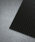 Heavy Duty Vinyl Round Rib Floor Mat For Tough Garages And Workshops Rock Solid One Eighth Inch Thick Build against concrete surface.