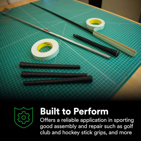 Double Coated Paper Adhesive Tape 410M Natural 1 in x 36 yd 5 mil roll with golf club and grips on table