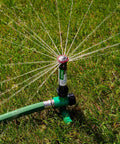 Pro Grade Hose End Sprinkler With High Efficiency Rotary Pattern, Hand Adjustable 45 to 270 Degree Coverage, installed on lawn